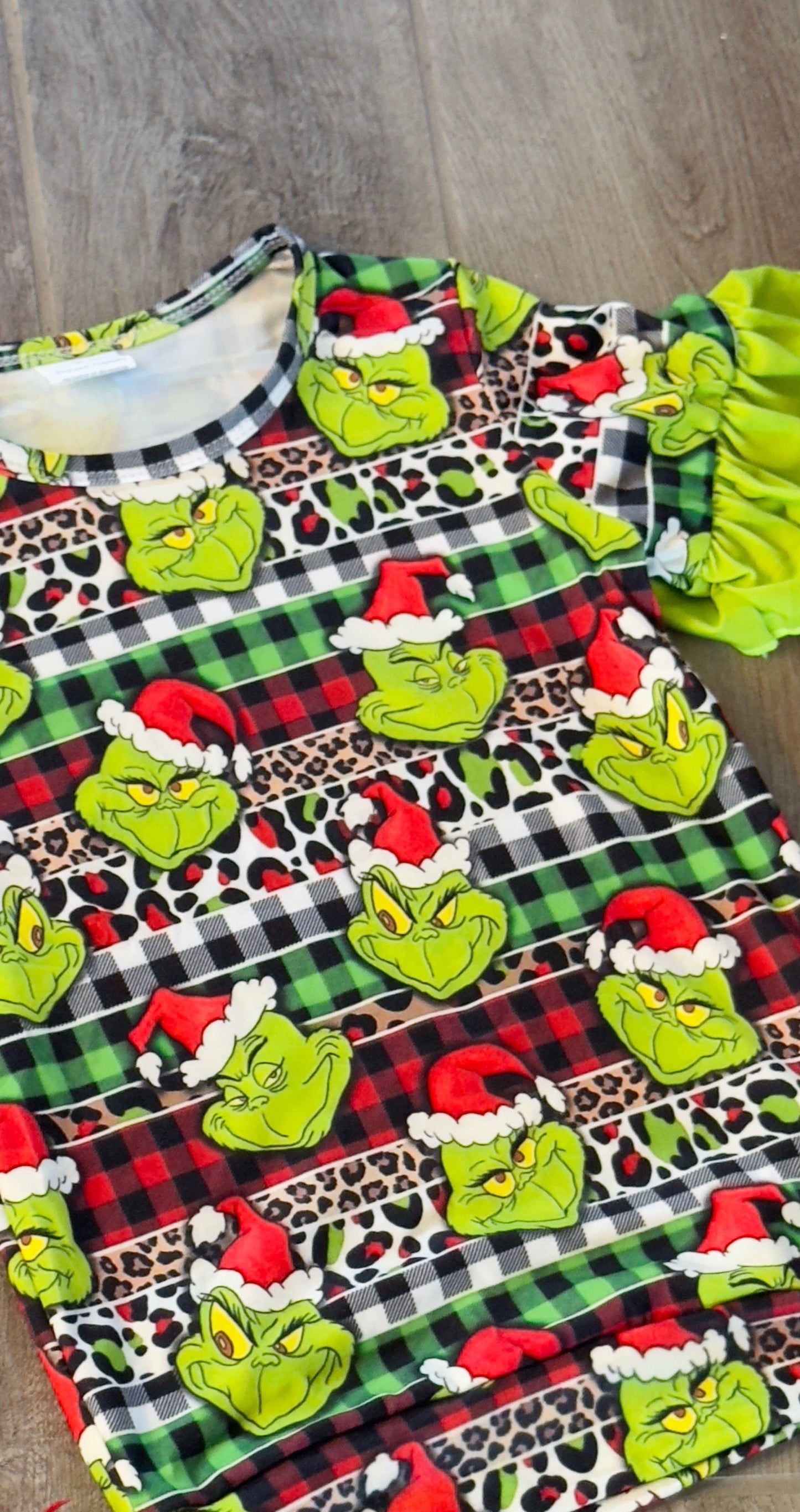 Girls Grinch Ruffle Top