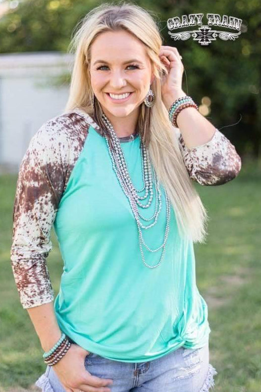 Turquoise Cowhide Twist Hem Raglan - Nico Bella Boutique 